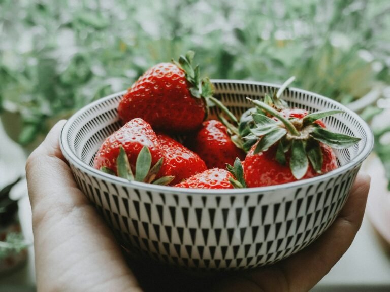 Fresh strawberries in a basket ready to prepare